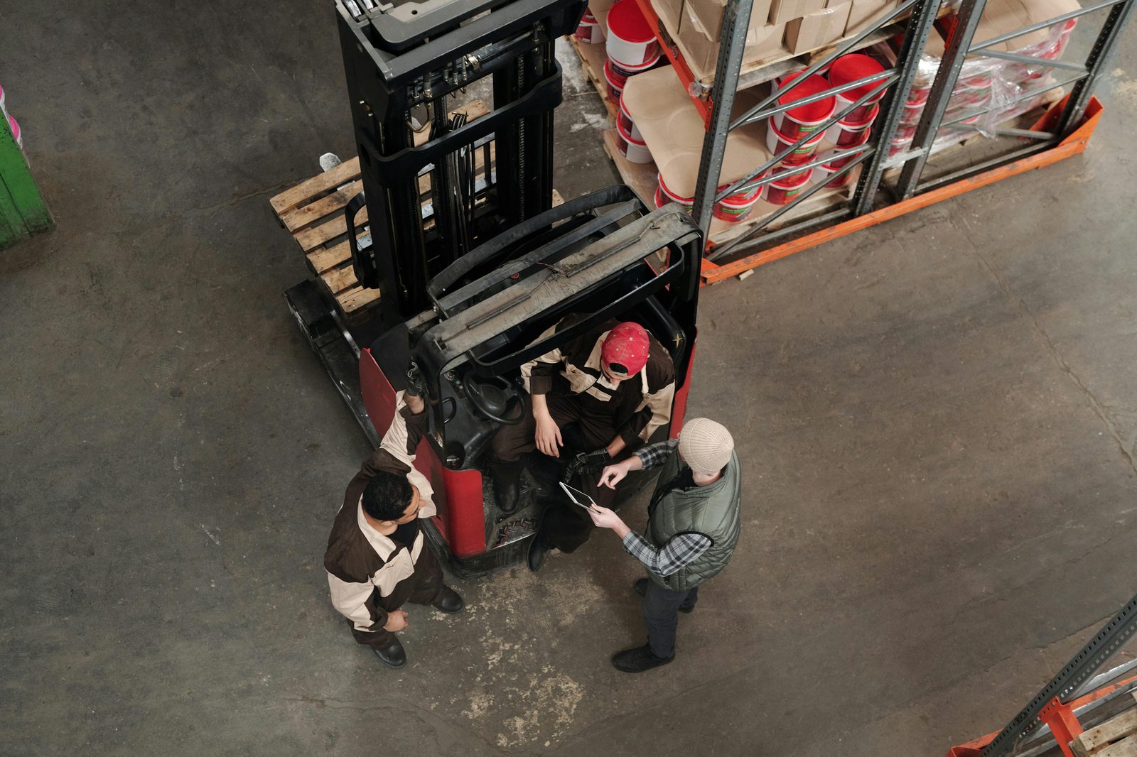 Forklift moving material at an industrial worksite